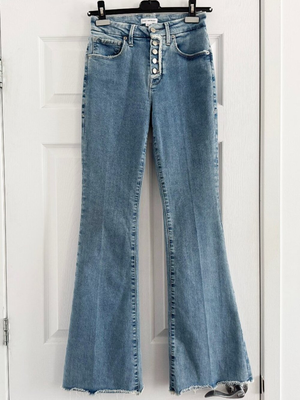 Good American "good legs" flare jeans in Light Blue, size 26